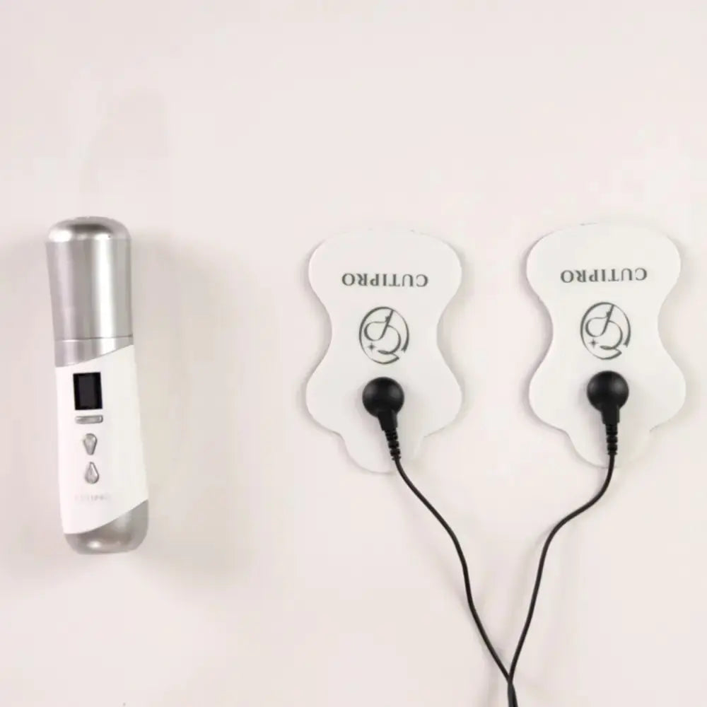 INCELLA CUTI PRO connected to two EMS body patches for targeted upper-arm and abdominal care at home