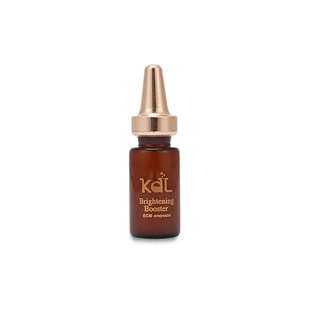 Close-up of KDL Brightening Booster brown glass ampoule containing concentrated brightening essence.