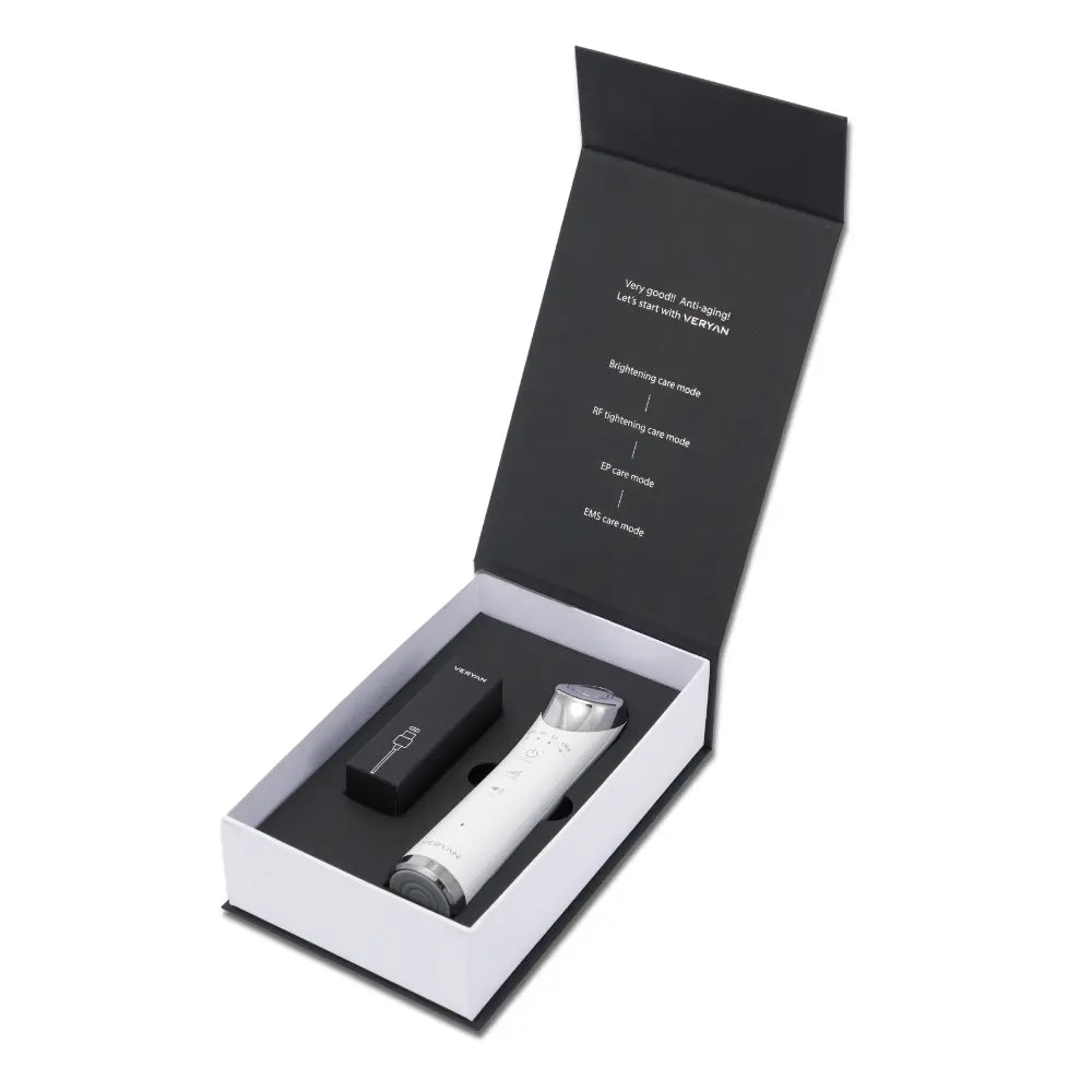 Premium packaging of VERYAN Seoul all-in-one skincare device including charging dock and manual, ideal for at-home anti-aging care.