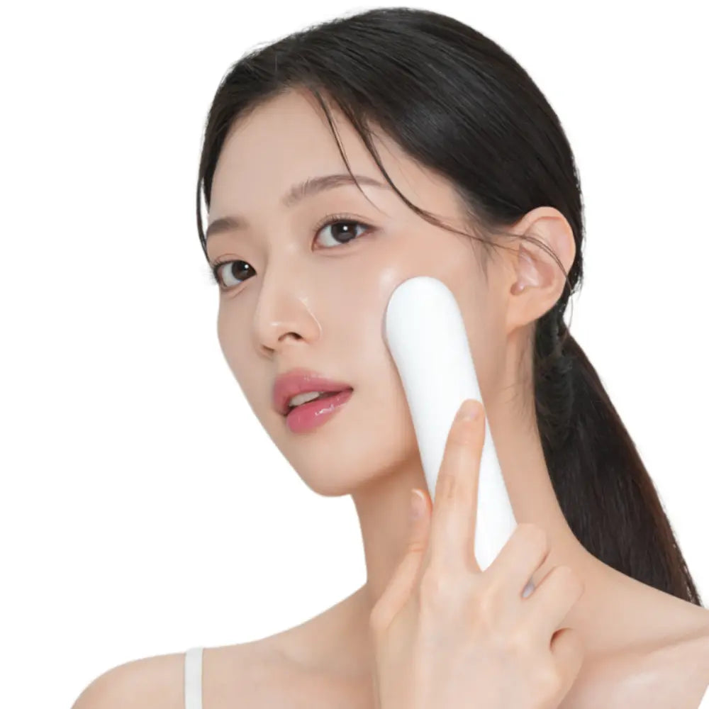 Model using VERYAN RF and EMS beauty device for skin tightening, wrinkle reduction, and glowing complexion.