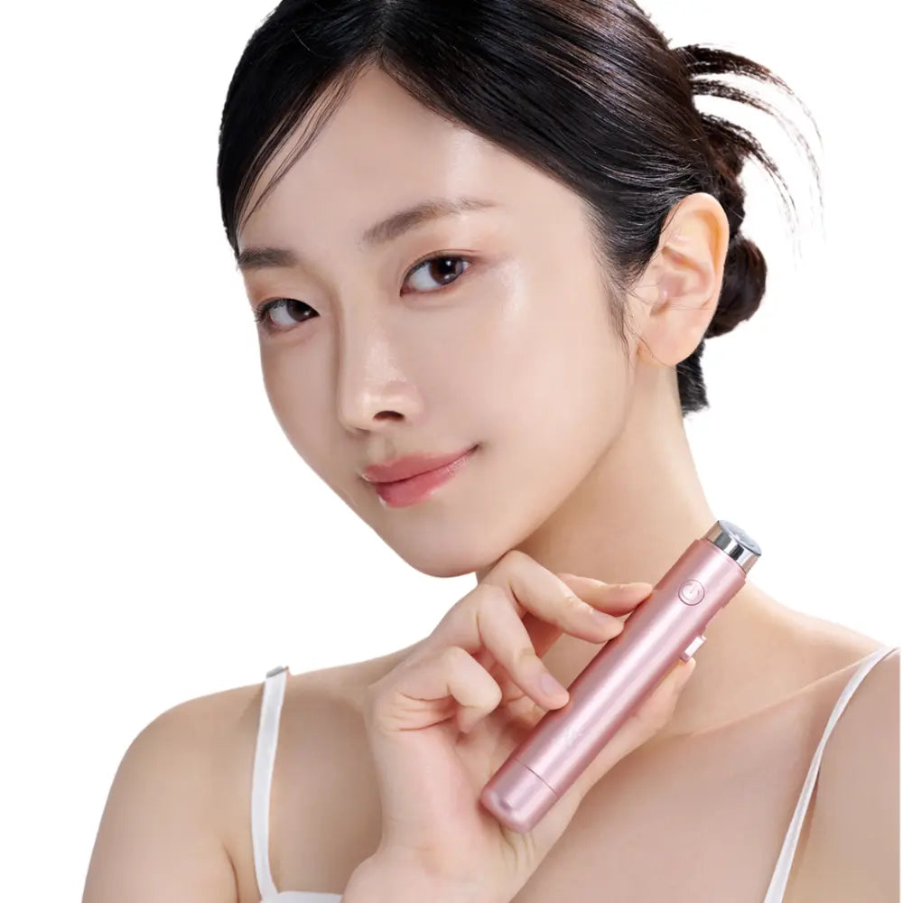 Model applying VERYAN Serum Stick to improve skin hydration, elasticity, and glow through electroporation technology.